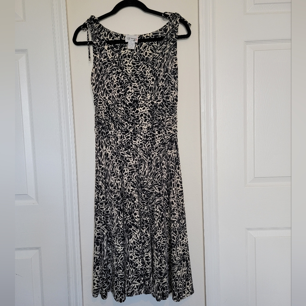 D.J. Summers cream and black dress.